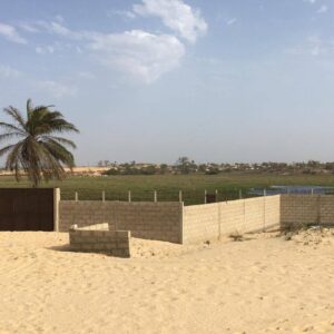 Terrain d'Exception de 1200 m² Clos et Équipé – Ndiokhop (Proche Warang)